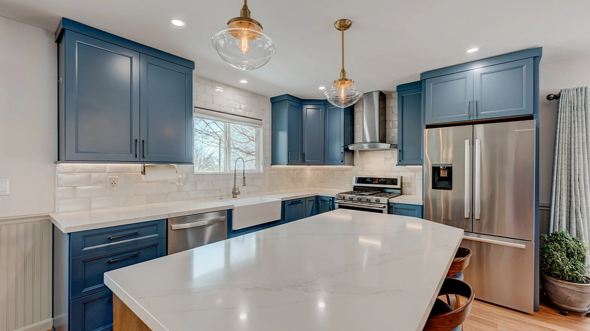 Refinished kitchen cabinets by Westchase Painting Company