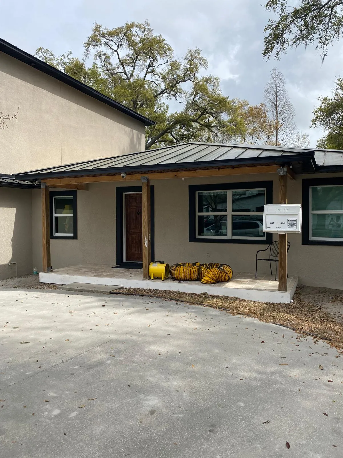 Stucco home exterior freshly painted by Westchase Painting Company
