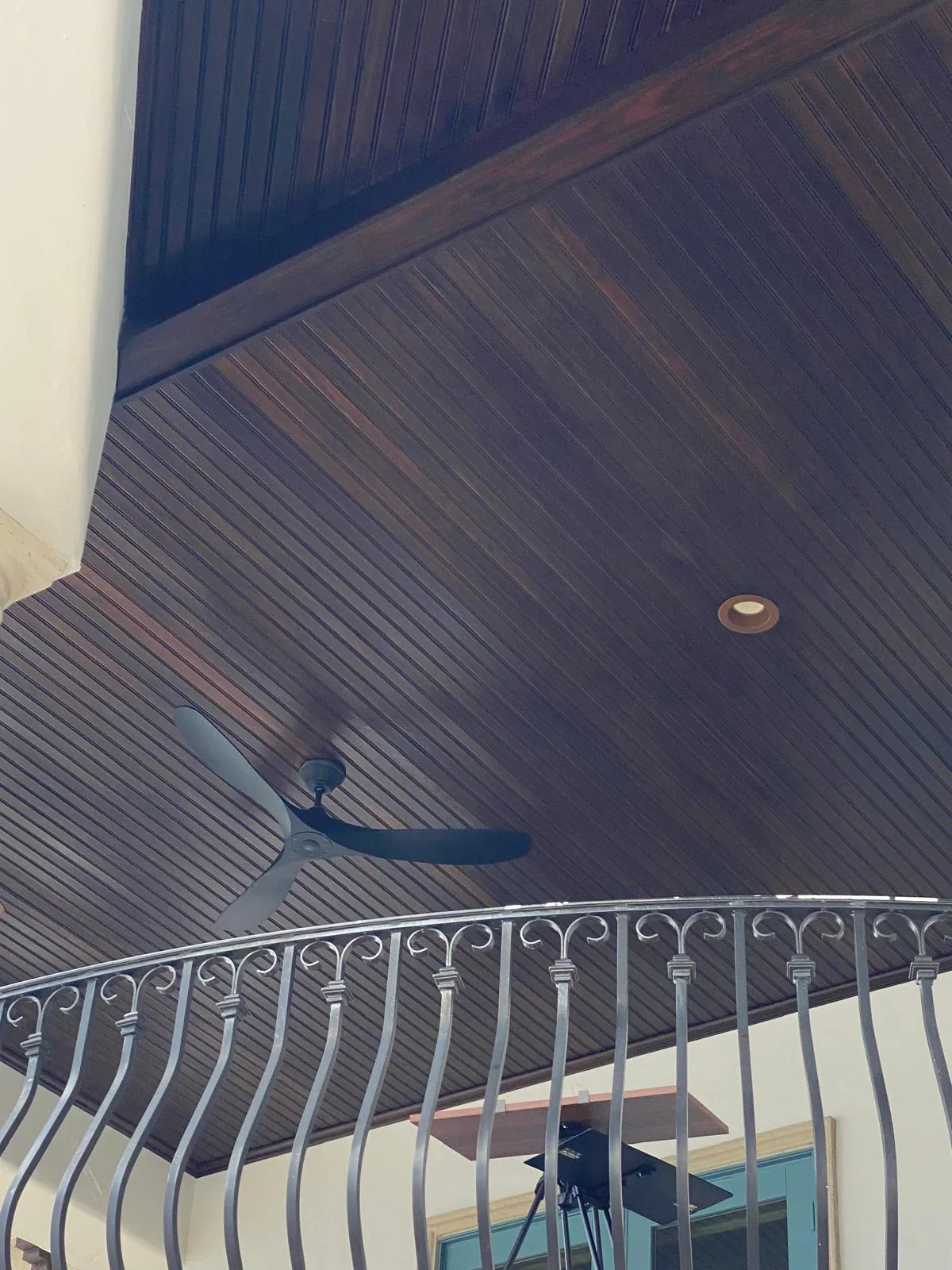 Detailed finish coat application on interior staircase and trim