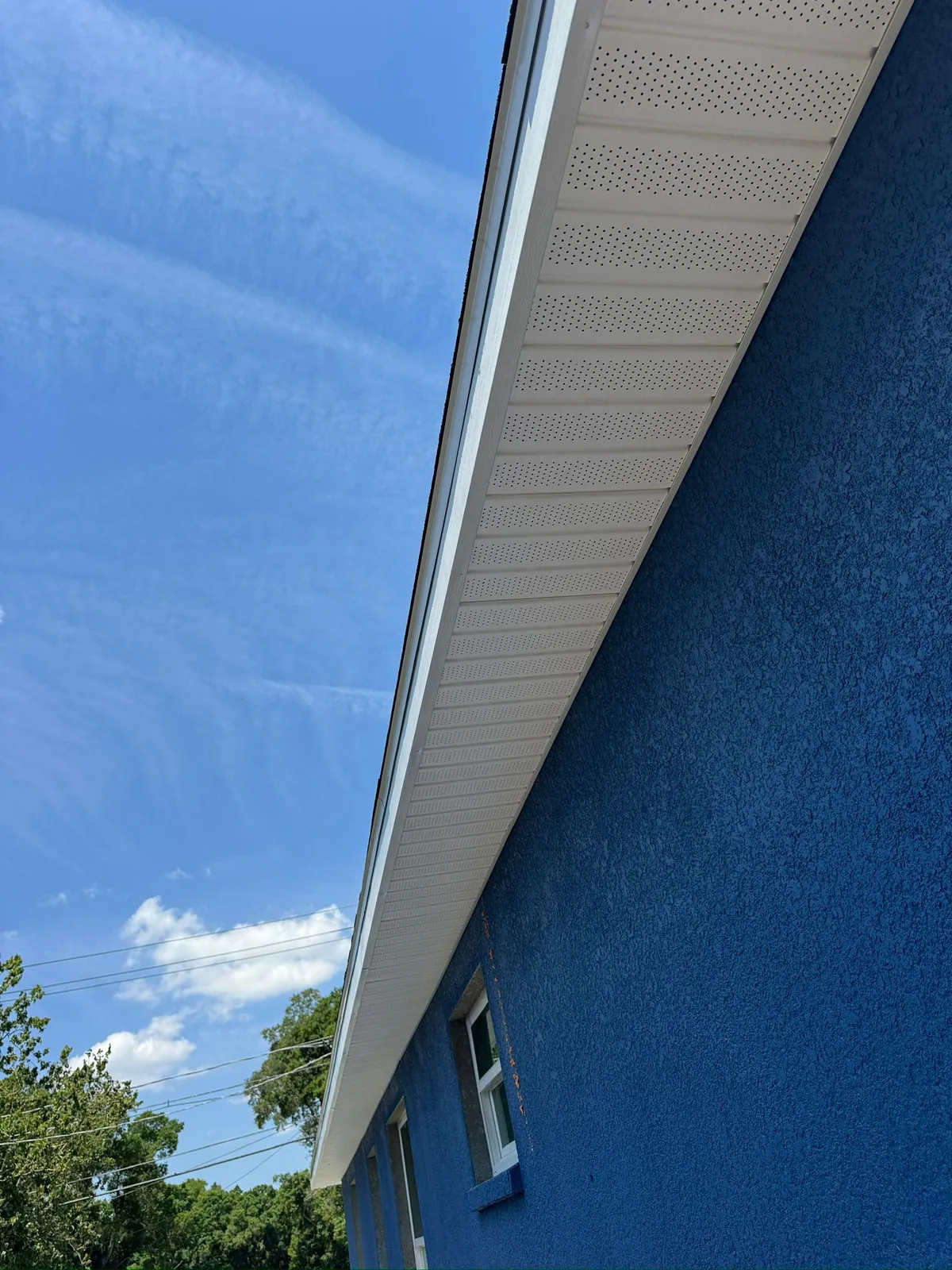 Close-up quality inspection of painted trim and corner detail work